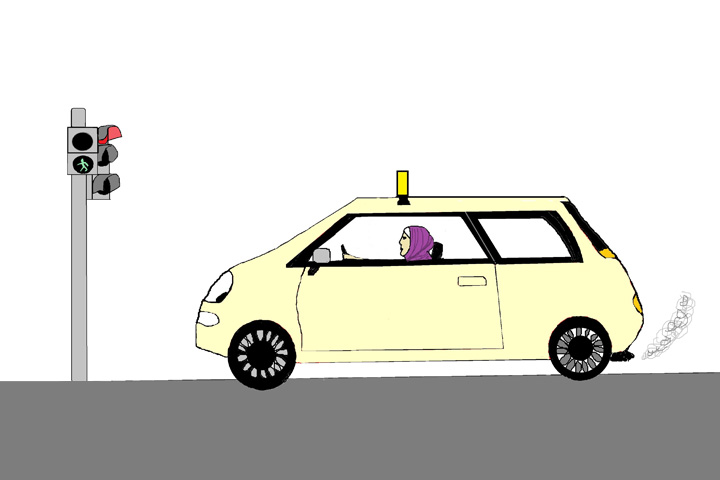 Taxi steht vor einer Ampel